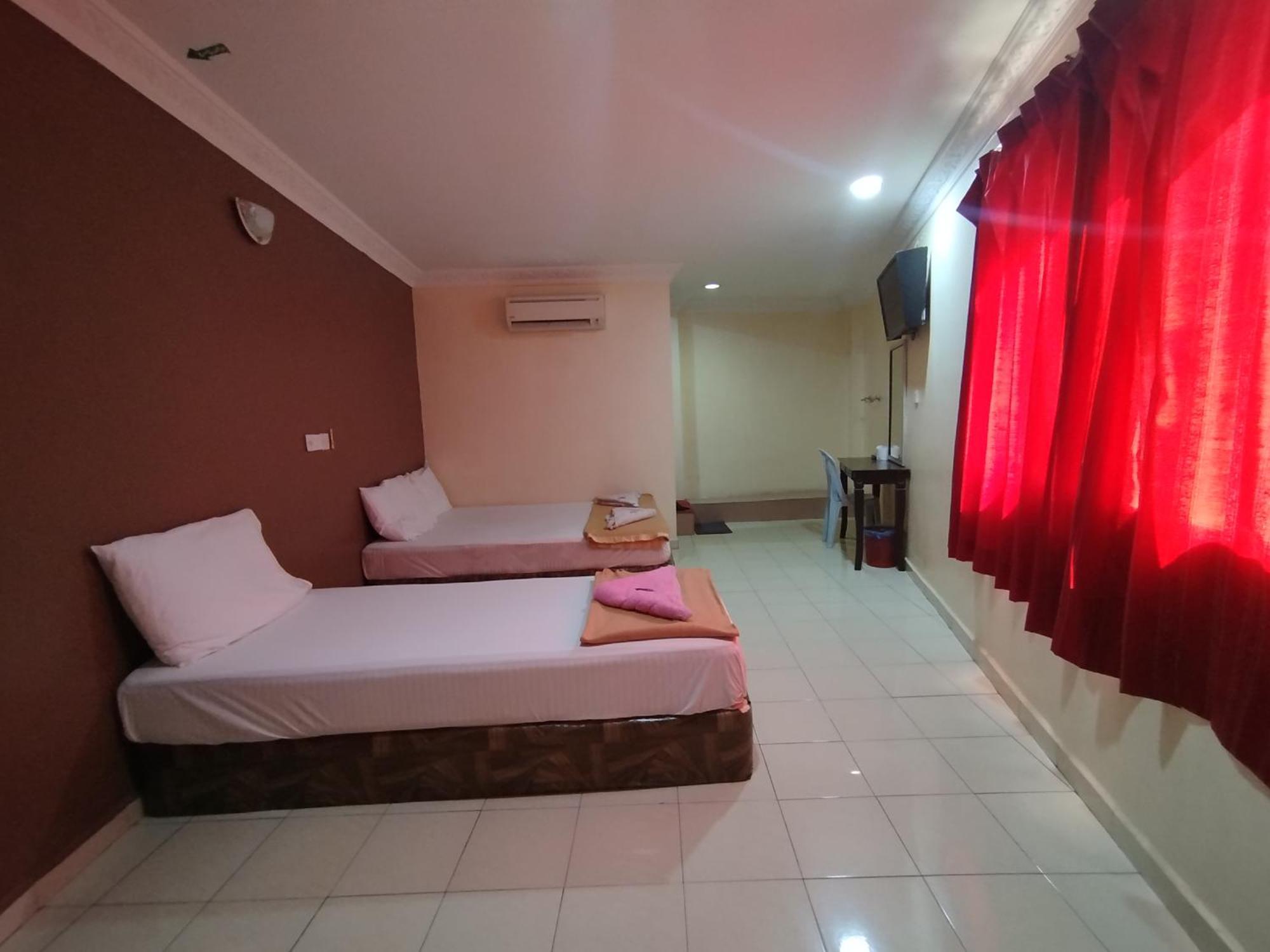 Sentosa Villa Hotel Кланг Экстерьер фото
